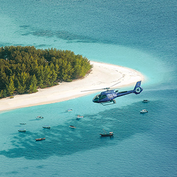 Arrive in elegance and style with your private Helicopter Taxi and get a first impression of the island from above.